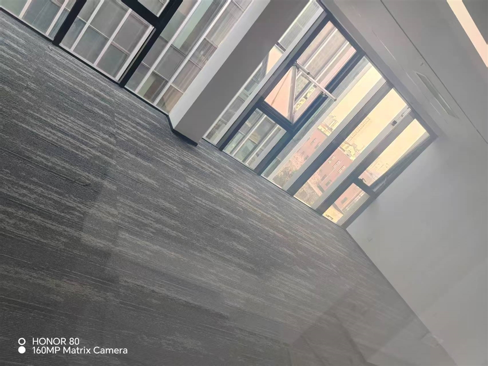 Conference room installation of Mohawk Disruptive Path 965 carpet tiles