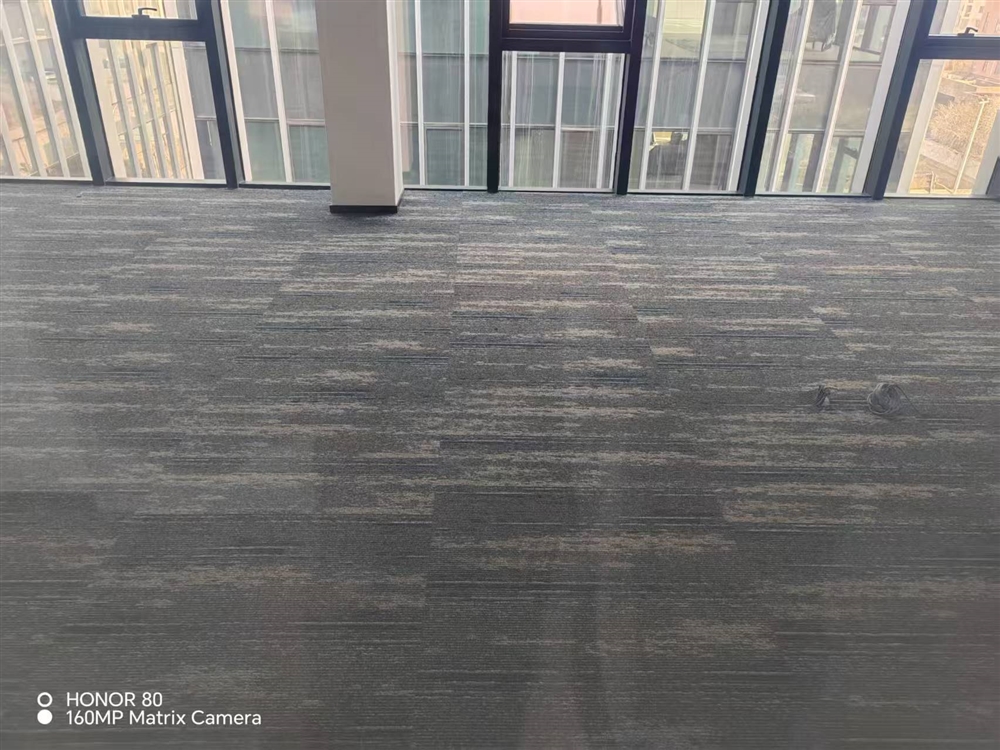 Conference room installation of Mohawk Disruptive Path 965 carpet tiles