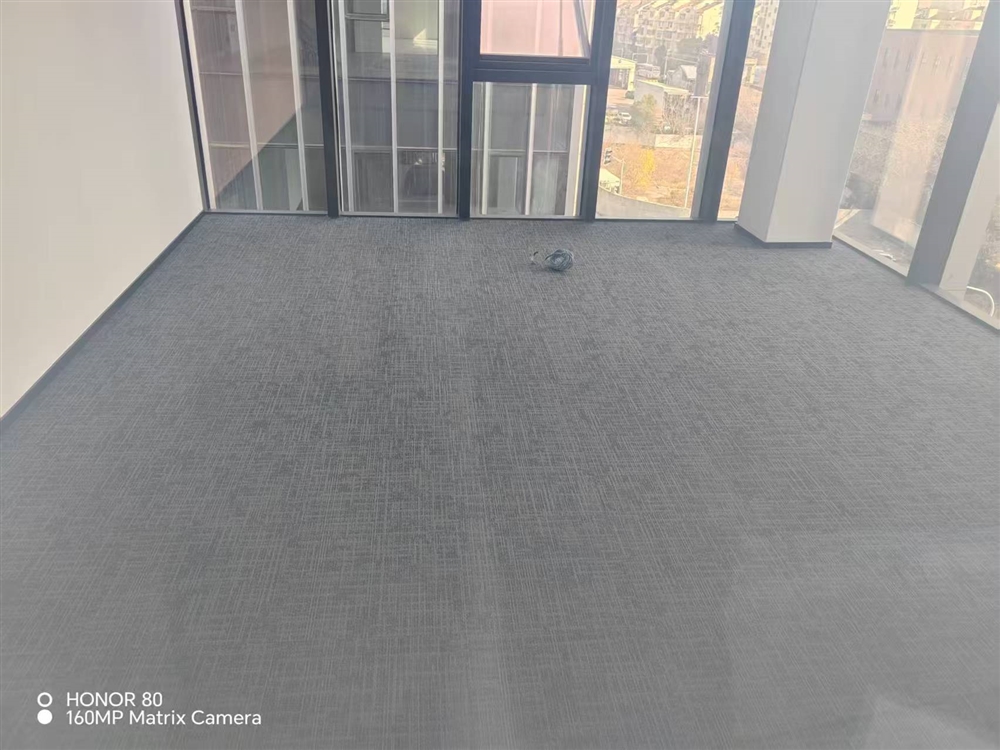 Private office installation of Milliken Nordic Stories TTC13-119 ESKER carpet tiles